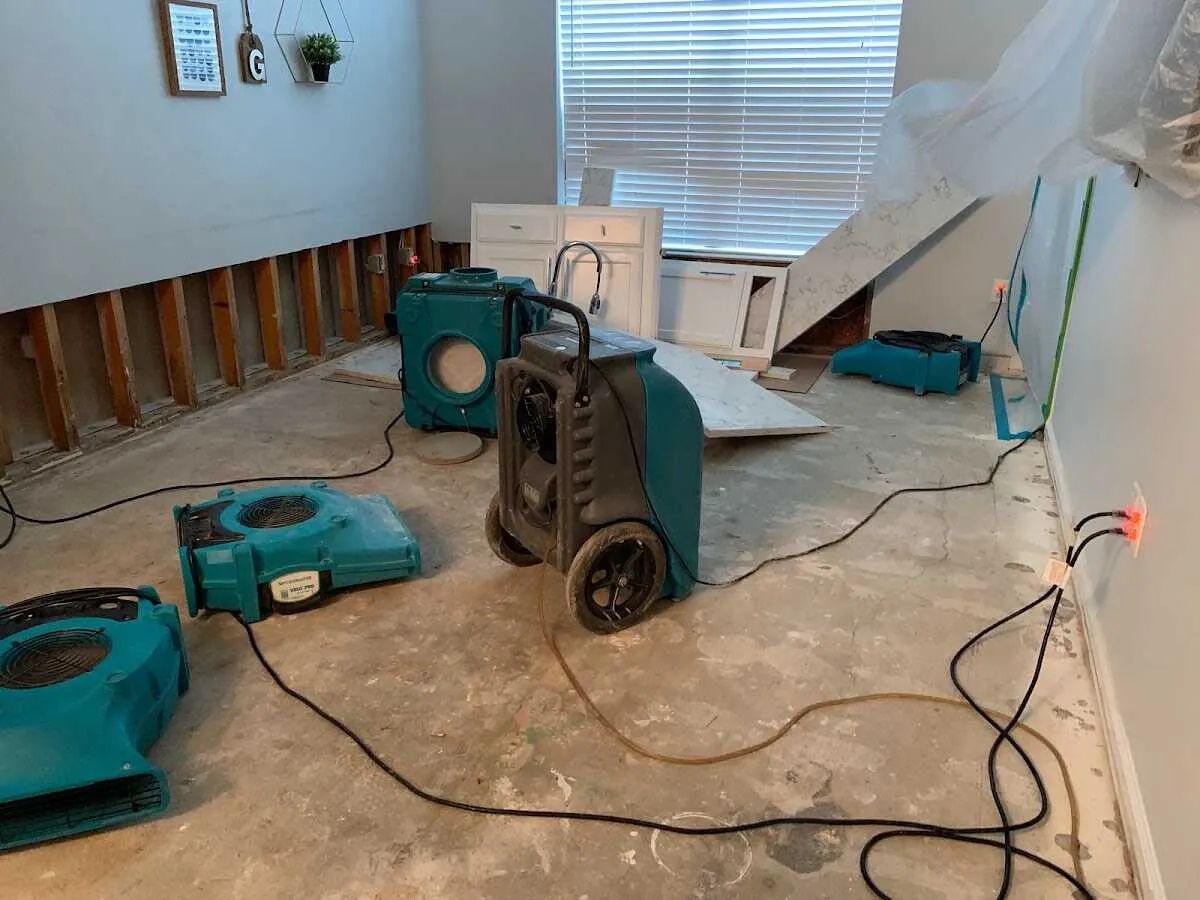 Dehumidifier in flood-cut room for Water Damage Restoration in Loganville